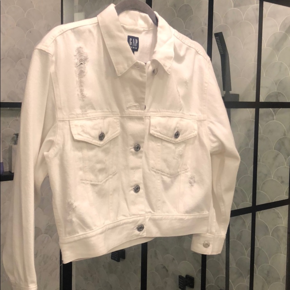 Distressed white denim jacket